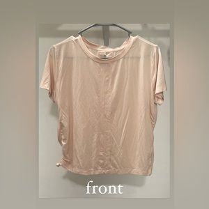 basic pink shirt with small slit in the back